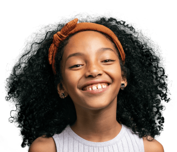 Young girl with beaming smile